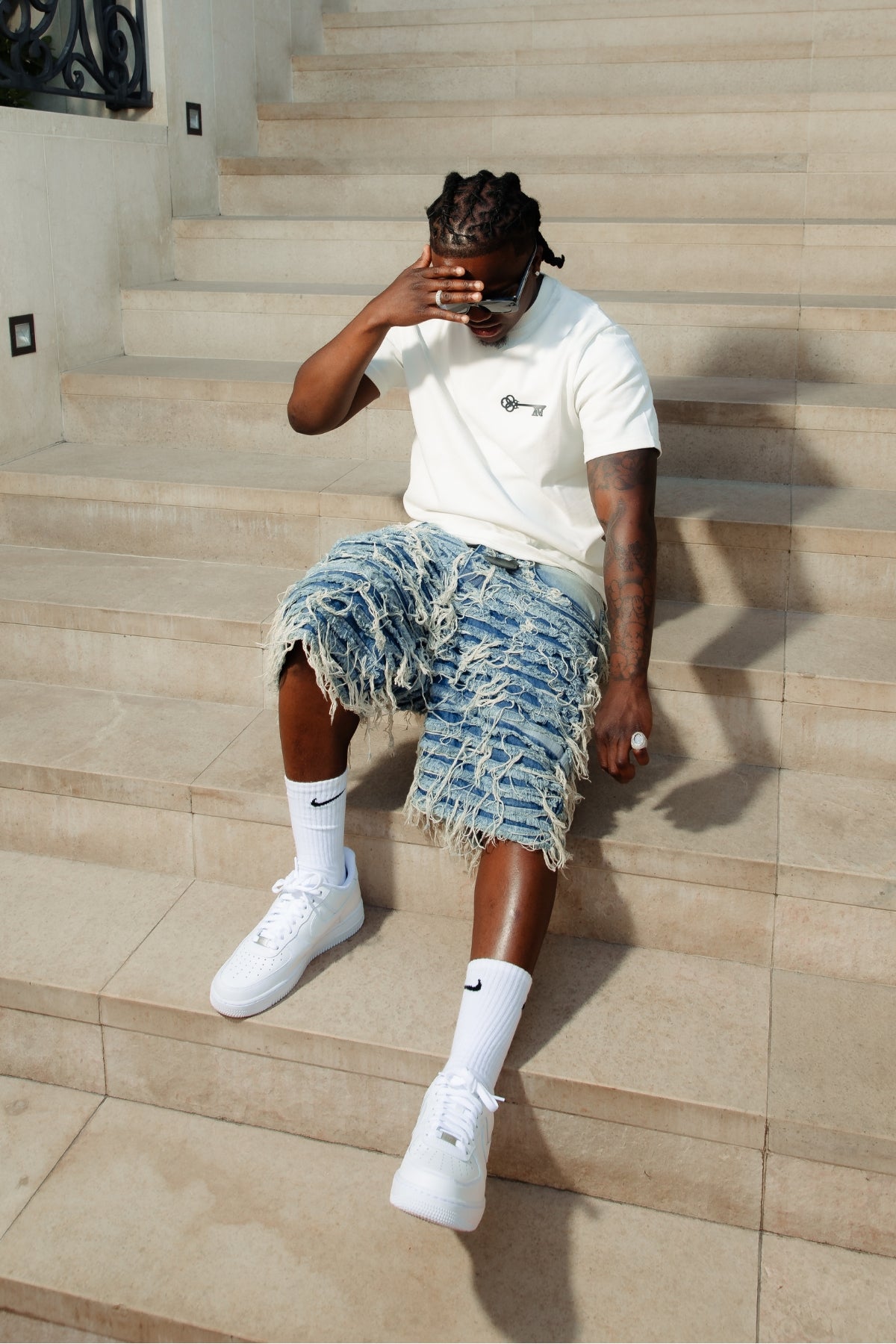 Shorts de mezclilla azul desgastados Sassari