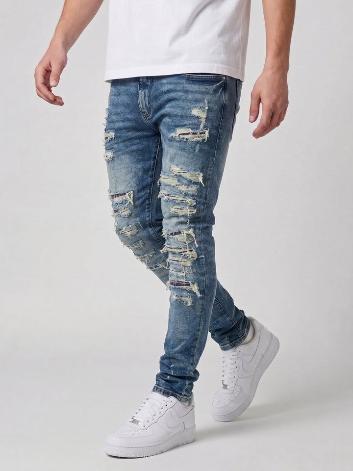 Jeans ajustados de mezclilla azul medio desgastados Belvedere