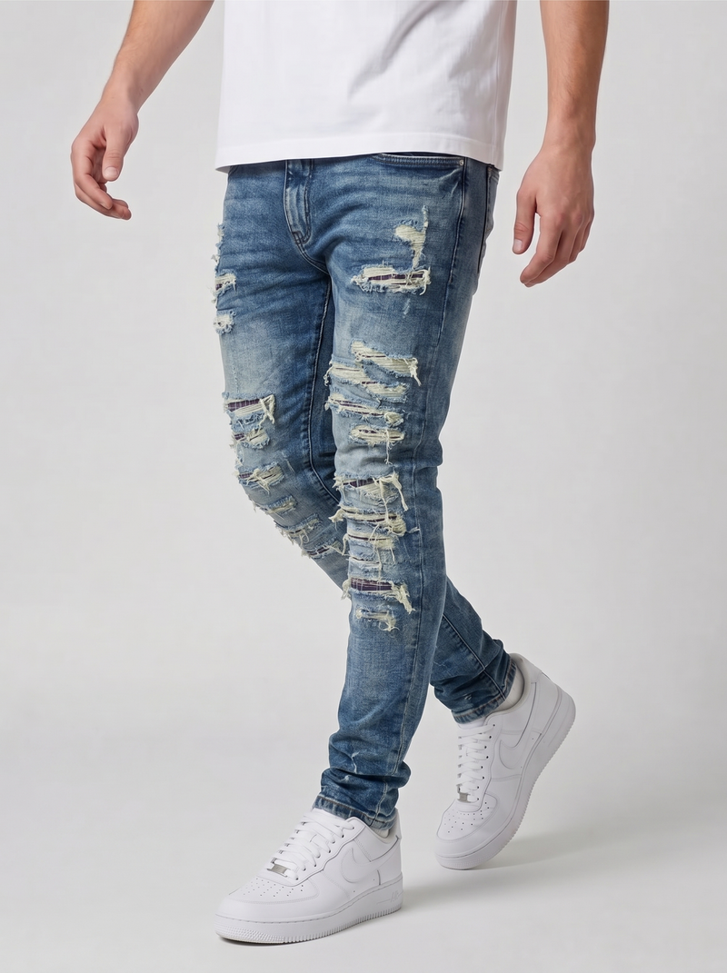 Jeans ajustados de mezclilla azul medio desgastados Belvedere