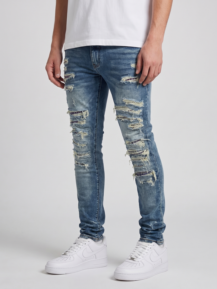 Jeans ajustados de mezclilla azul medio desgastados Belvedere