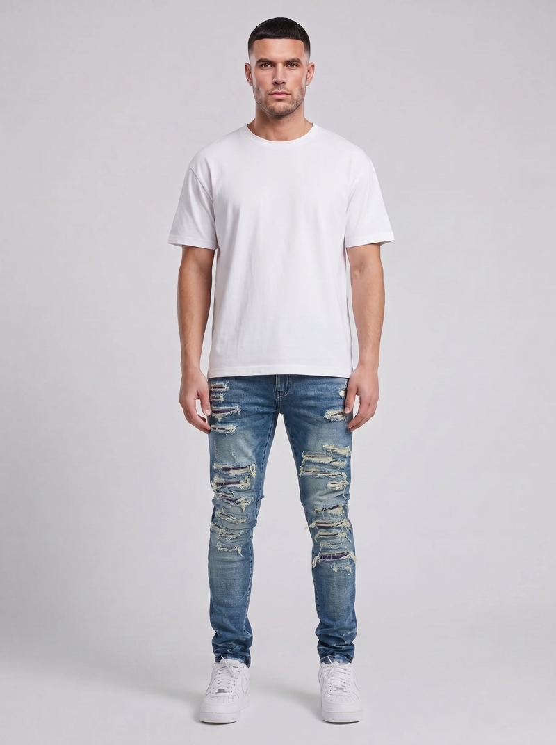 Jeans ajustados de mezclilla azul medio desgastados Belvedere