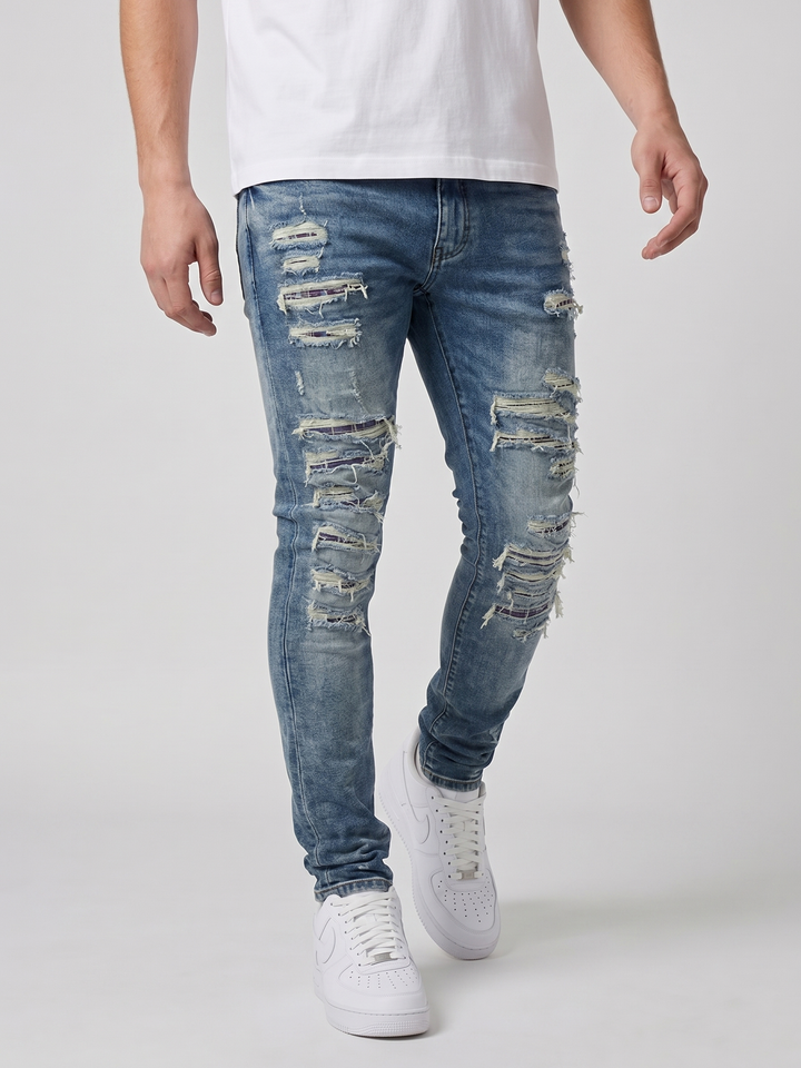 Jeans ajustados de mezclilla azul medio desgastados Belvedere
