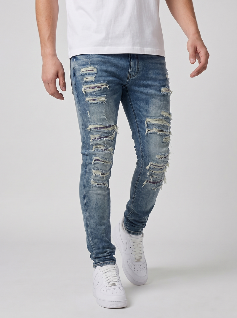 Jeans ajustados de mezclilla azul medio desgastados Belvedere